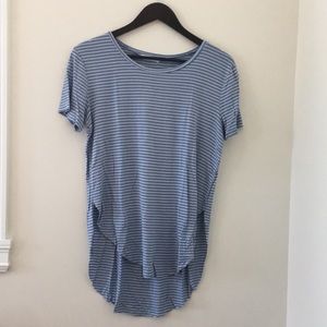 Asymmetrical blue shirt with white stripes